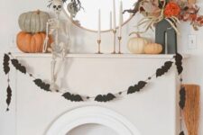 42 a round mirror with black branches on top is a cool idea for Halloween, it’s very easy to make