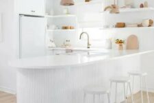 a sleek all-white kitchen design