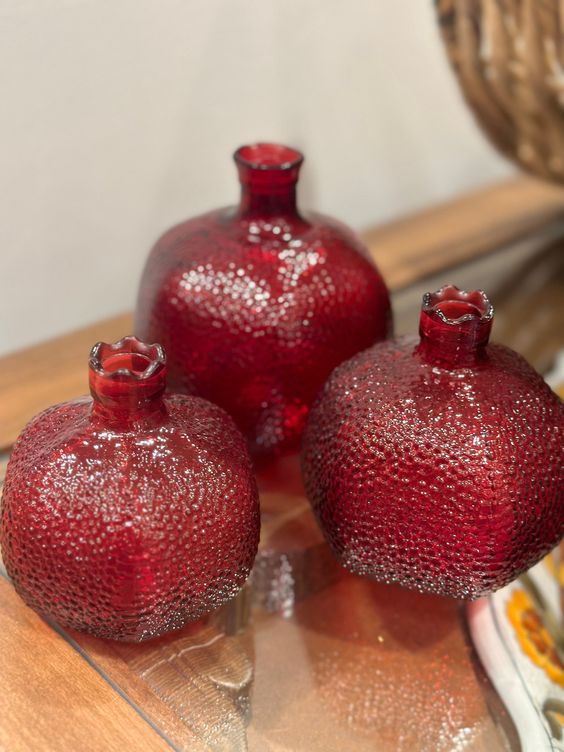 beautiful red glass pomegranate-shaped vases will be great for both fall and winter and for Christmas