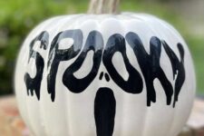 47 a black and white Halloween pumpkin done with simple black and white paint is a cool and catchy decor idea