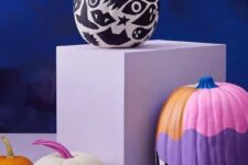 50 a black and white painted pumpkin and a colorful one will be a nice idea for Halloween