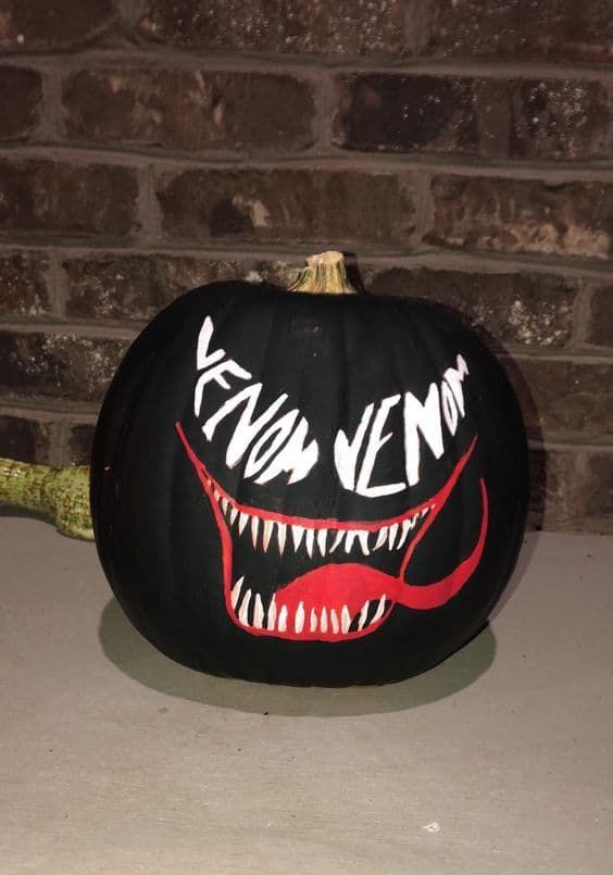 a painted Venom pumpkin is a cool and fun decor idea for Halloween, especially if you are a fan