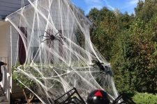 52 realistic spiderweb and realistic giant black and red spiders will make your house look very Halloween-like, you won’t need other decor