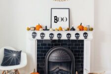 55 fun and bright Halloween mantel decor with gourds and pumpkins, candles, a banner and a chic sign, pumpkins on the floor