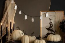 59 simple Halloween mirror decor with some cheesecloth and a ghost garland is a cool and fast to realize idea