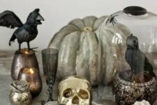a cool halloween arrangement with a heirloom pumpkin