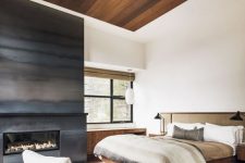 a modern cozy bedroom with wooden ceiling