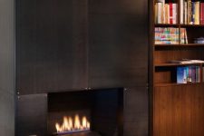 a black metal clad fireplace will make your living room stand out, it will add texture and color