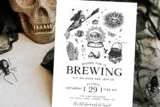 a classy black and white Halloween party invitation with all things that are clasically Halloween-like is a cool idea
