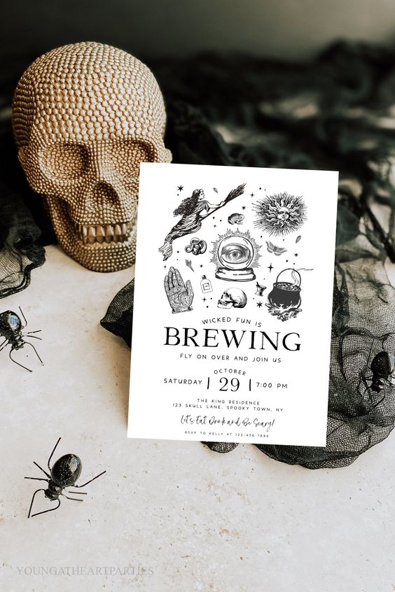 a classy black and white Halloween party invitation with all things that are clasically Halloween-like is a cool idea