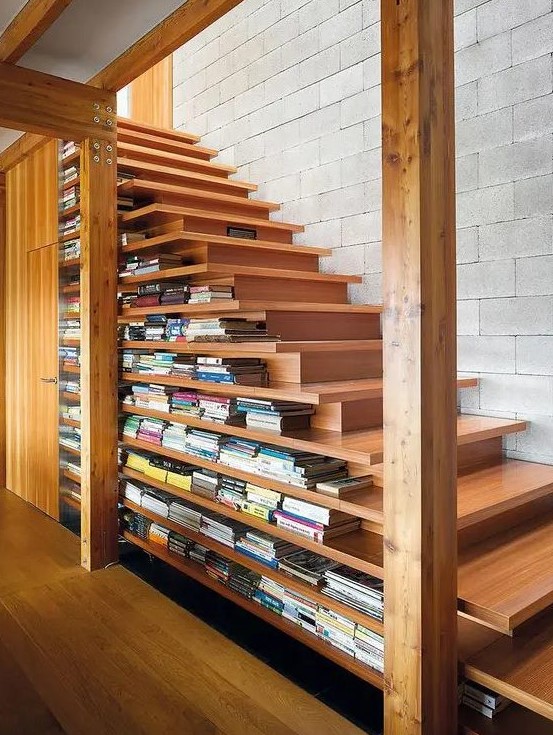 A contemporary light stained staircase that includes enough space for storing books due to the two sided steps