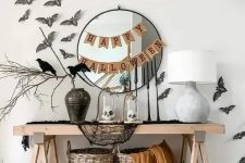 a simple console table decor for Halloween