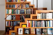 a creative staircase with bookshelves integrated right into it – a great space-saving idea