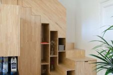 a minimal stained staircase with open storage compartments and some hidden ones is a lovely idea to save the space