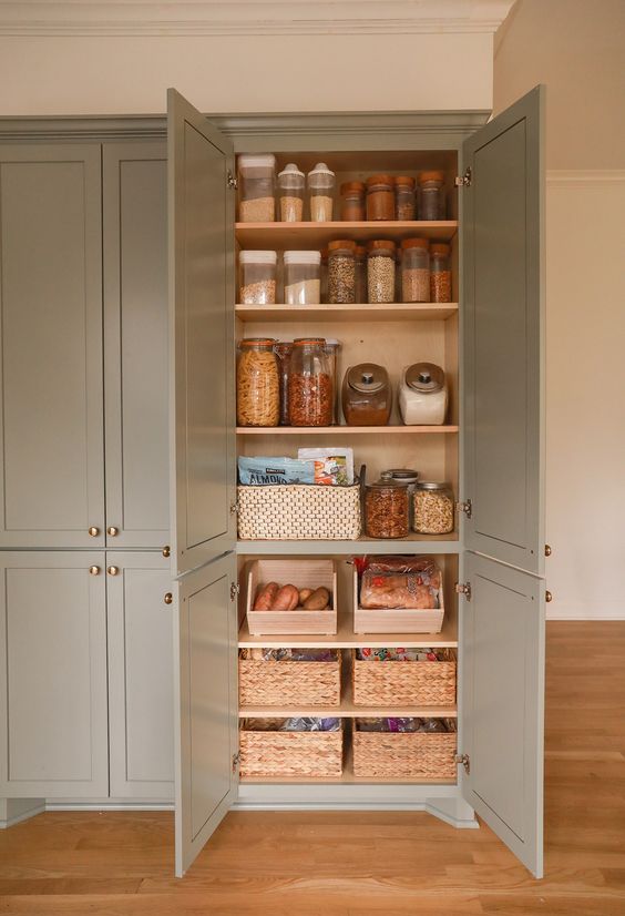 a pantry as a food storage unit, with shelves, jars and baskets, boxes with food is a cool solution for a kitchen