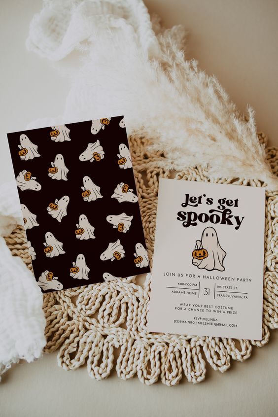 a pretty and cute Halloween party invitation with a ghost and a black envelope with ghosts is lovely