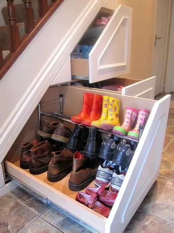 a staircase with built-in drawers for shoe storage is a cool idea for every home, hide away all the boots you arne't wearing now
