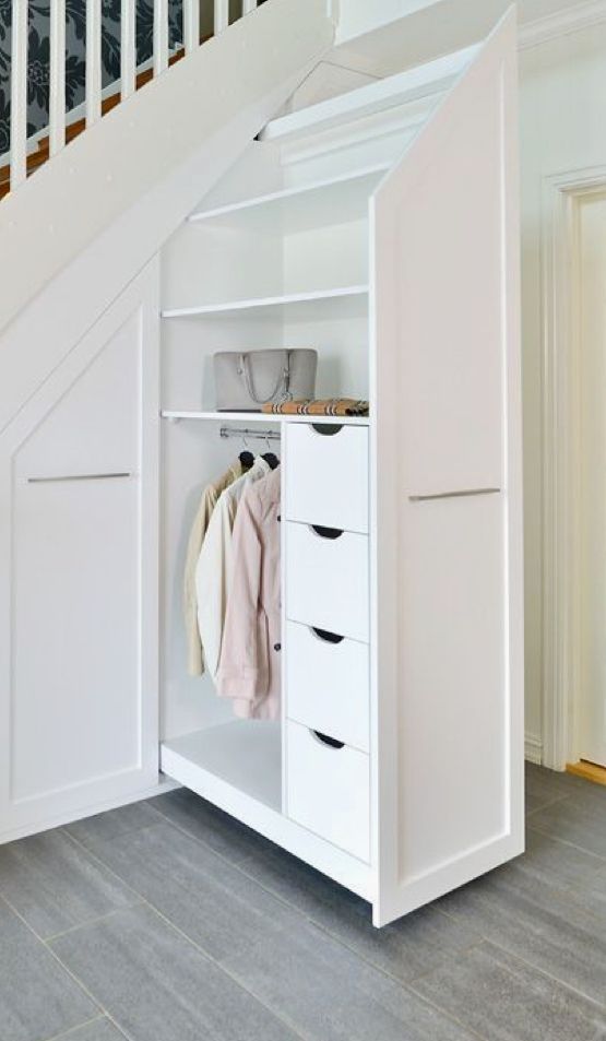 a staircase with retractable drawers and open shelves is a stylish idea for a mmodern home, it can substitute a whole closet
