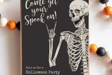 a stylish black and white Halloween invitation with a skeleton and modern lettering is a cool idea for a party