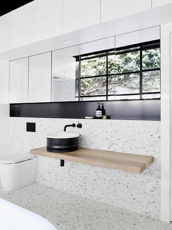 neutral terrazzo with grey spots looks very airy and modern interesting than just white surfaces