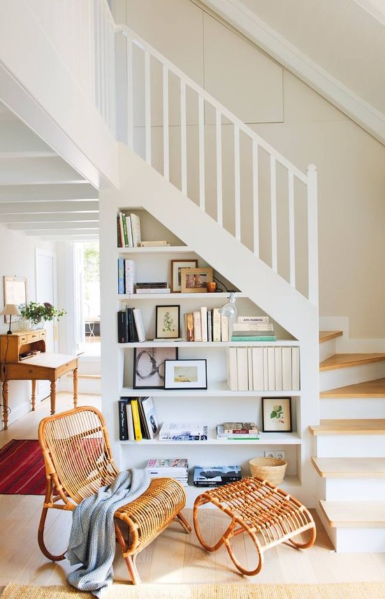 Open built in shelves in the staircase are a cool solution, they will save your space and make it cooler