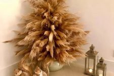 a mini pampas grass Christmas tree n a pot and non-decorated is a lovely decoration for an awkward nook or if you don’t have much space
