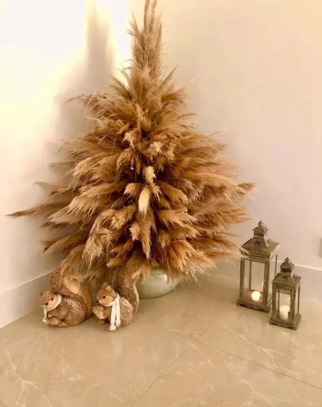 A mini pampas grass Christmas tree n a pot and non decorated is a lovely decoration for an awkward nook or if you don't have much space