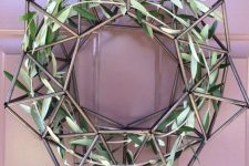 a modern himmeli Christmas wreath with olive branches is a lovely idea for a modern Christmas porch