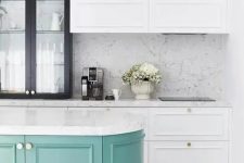 09 a chic white kitchen with shaker style cabinets and a black glass one for more drama, a turquoise curved kitchen island and white stone countertops