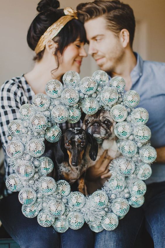 a disco ball wreath in silver is a cool NYE or Christmas party idea that you can easily DIY