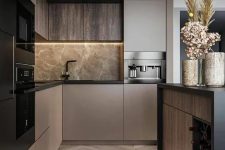29 a sophisticated taupe contemporary kitchen with dark stained and taupe cabinets, grey marble and black fixtures plus black built-in appliances