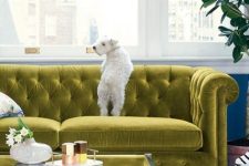 a refined chartreuse tufted sofa is a cool color statement in this neutral glam living room and it looks amazing