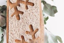a beautiful and non-typical Christmas string art piece with snowflakes is adorable, it can be used for winter, too