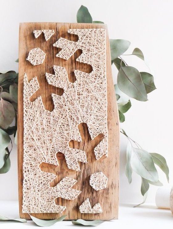 A beautiful and non typical Christmas string art piece with snowflakes is adorable, it can be used for winter, too
