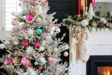 a cute flocked christmas tree with colorful ornaments