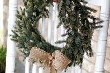 a classic Christmas wreath of evergreens, a burlap bow and plaid ribbon is always a good idea for the holidays