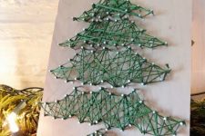 a creative Christmas tree string art piece is a lovely and chic decor idea for any modern space