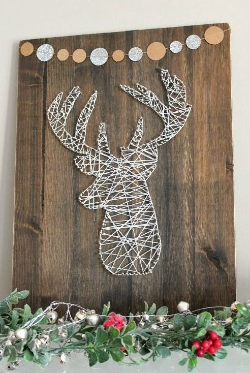 a deer head string art done in white will fit lots of spaces and will instantly bring a Christmassy and woodland feel to them