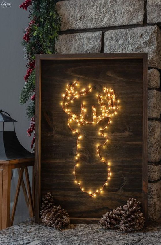a fantastic lit up Christmas deer sign composed of lights instead of strings is a lovely decor idea for the holidays