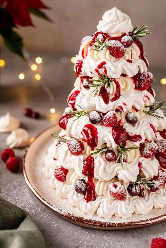 a gorgeous meringue Christmas cake with fresh berries is a perfect dessert for a holiday tea party