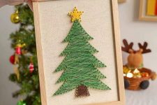 a pretty and easy Christmas tree string art piece in a frame is a cool and catchy decoration for the holidays