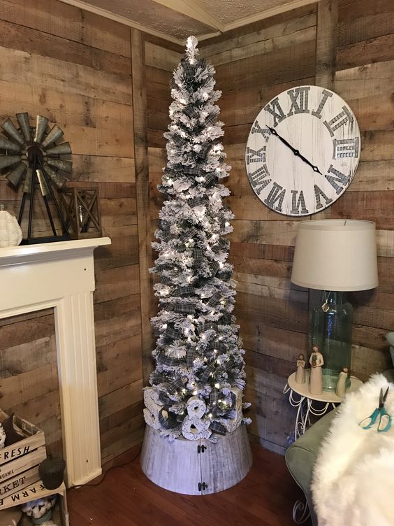 a white pencil Christmas tree with plaid ribbon, lights and monograms is a cool farmhouse decor idea