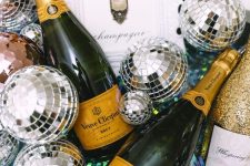 bottles in ice and sicp balls are perfec for styling a lovely NYE party, and such decor is effortless