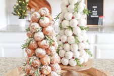 donut Christmas trees of profitroles will be amazing substitutes to usual cakes, they look cool