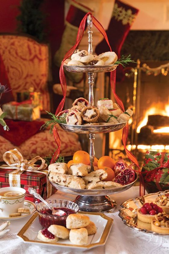 joyful holiday sweets stand and desserts displayed are rigth what you need for a Christmas tea party
