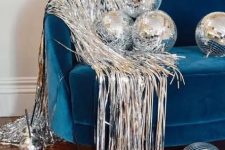 spruce up your lounge with disco balls and some silver fringe to make it ultimately bold and cool