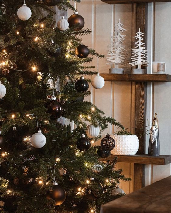 stylish Christmas tree decor with black, white and brown ornaments and lights is a super catchy and cool idea