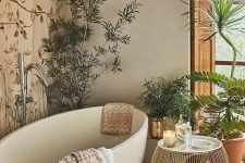 02 a botanical-inspired spa bathroom with an accent wall, an oval tub, lots of potted plants, an elegant round side table and candles
