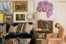 19 a bright maximalist living room with a dark green sofa and colorful pillows, polka dot chairs, a coffee table and a gallery wall