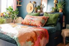 a maximalist bedroom with navy walls